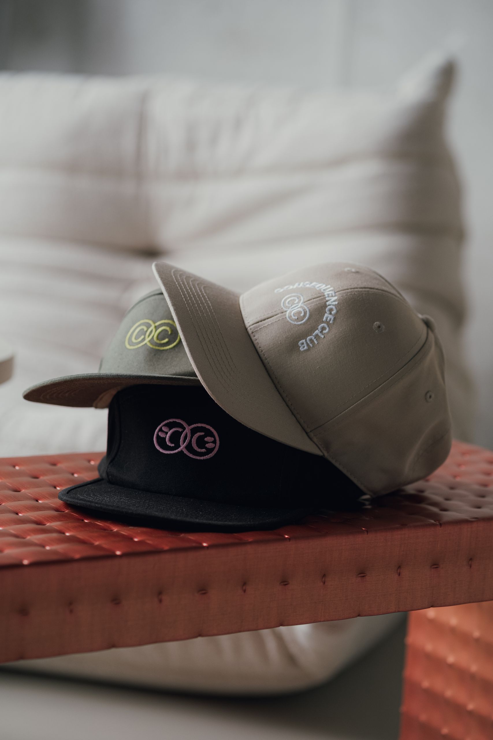 caps stacked, different colours