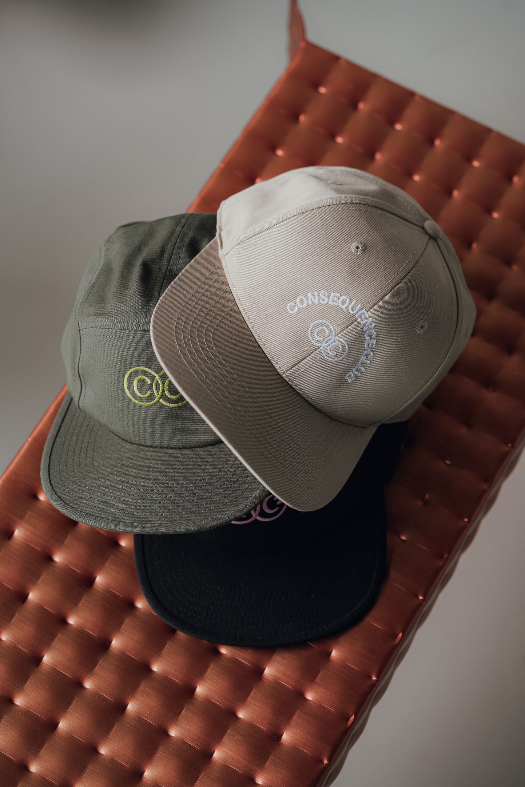 Stacked caps neutral colours
