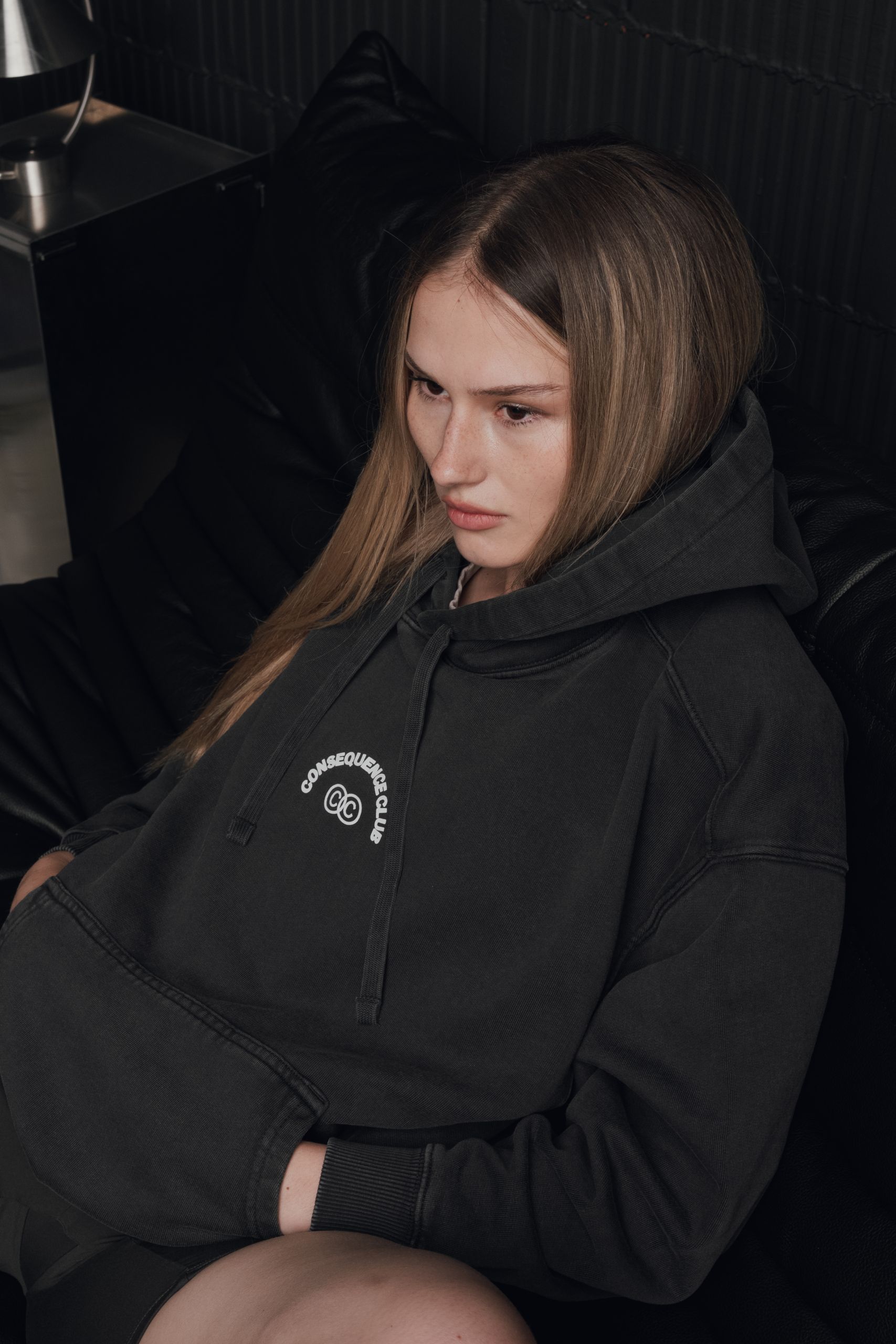 Young woman with black Hoodie