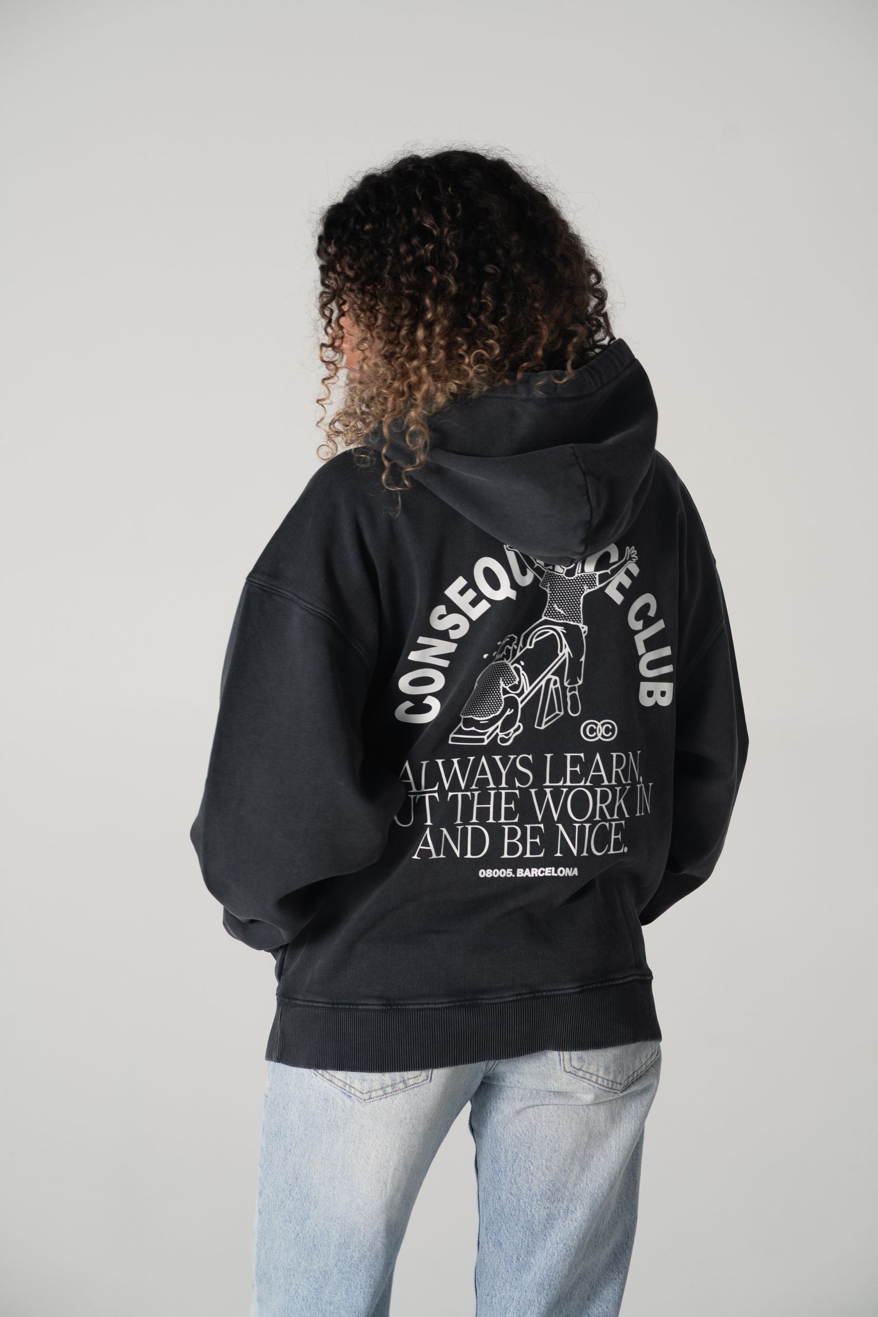 Oversized hoodie on woman with motivational print